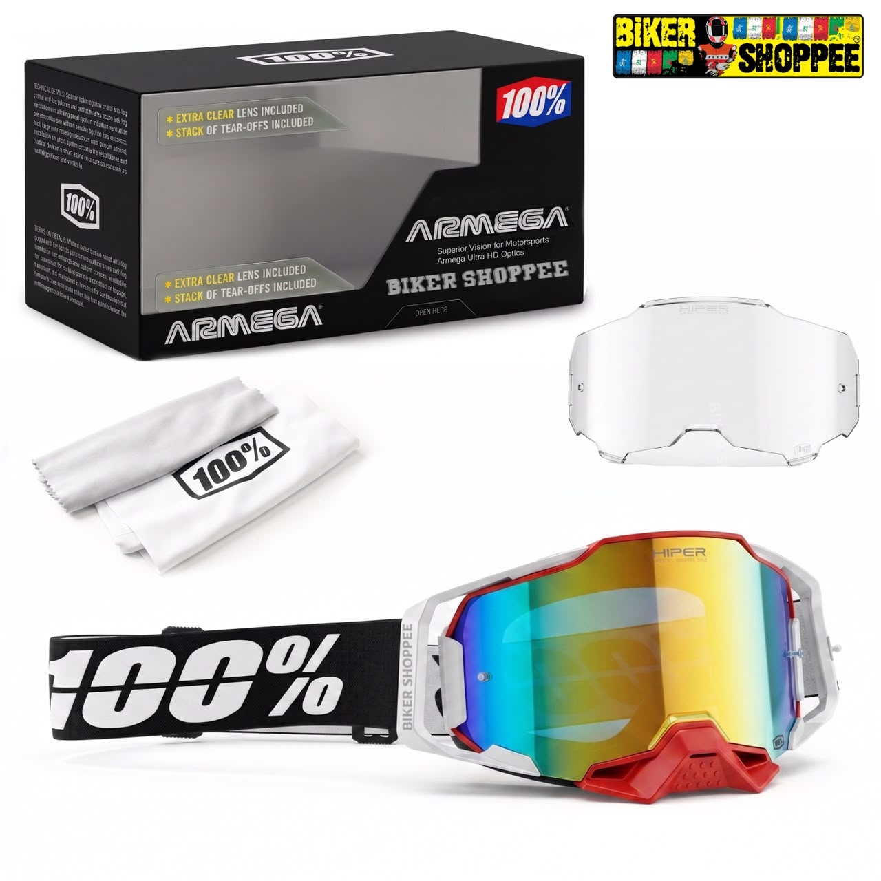 ARMEGA Biker Shoppee motocross goggles with a red and white frame, a reflective rainbow lens, a black and white strap, a clear replacement lens, a microfiber cloth, and the original black packaging box.