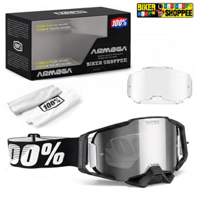 ARMEGA 100% extra large snow goggles with a black frame, clear lens, black and white strap, shown with the retail box, lens, and cleaning cloth on a white background.