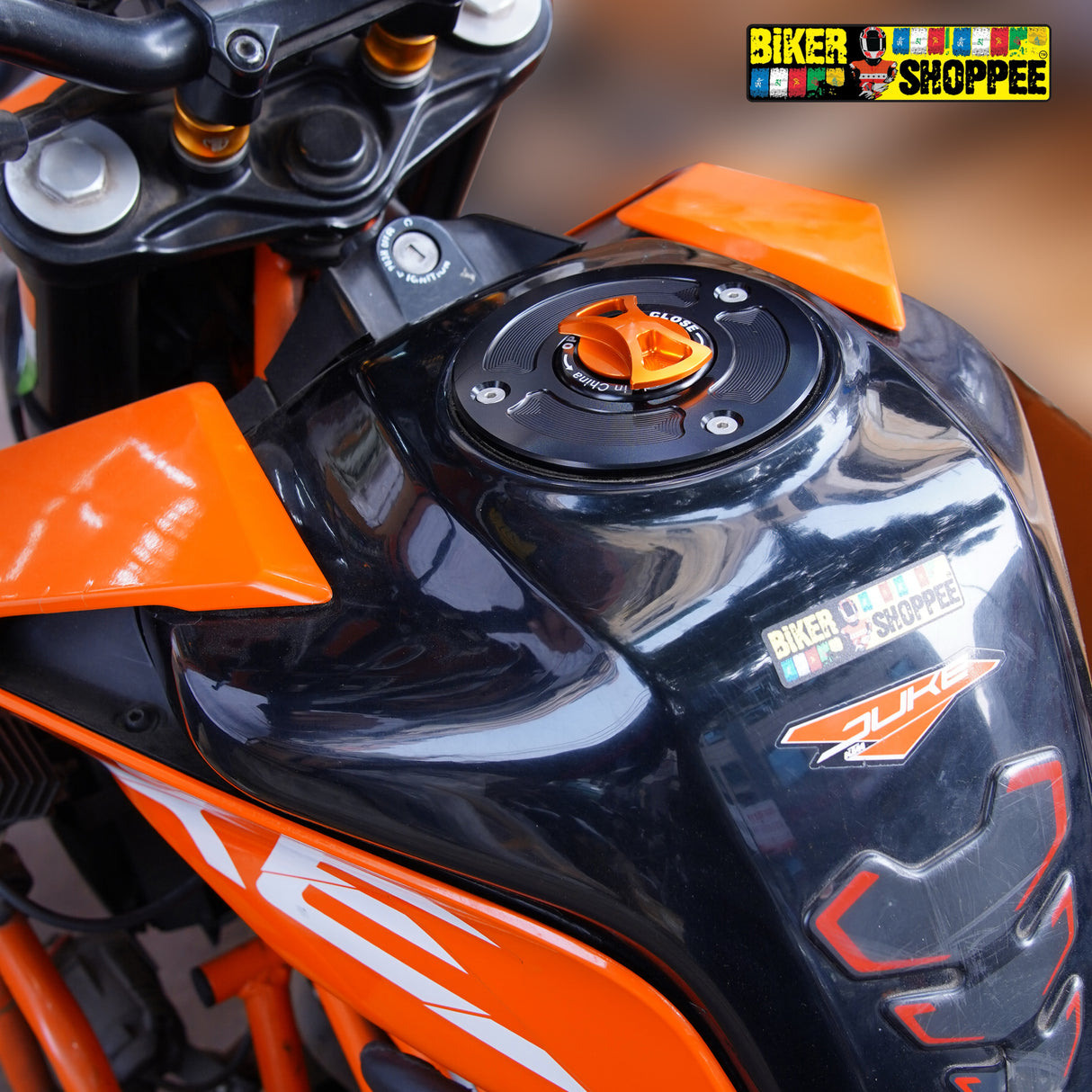 CNC Keyless Quick Release Fuel Tank Cap Orange and Black for KTM Duke 390 with Biker Shoppee stickers