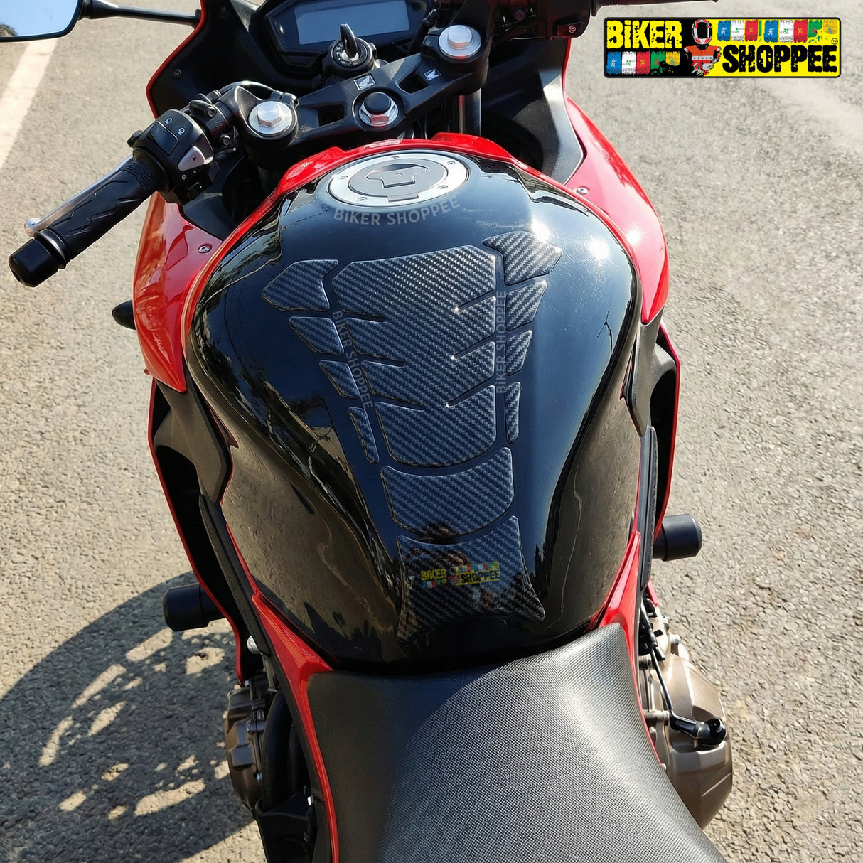 Universal carbon fiber motorcycle tank pad protector sticker with white border and Biker Shoppee logo