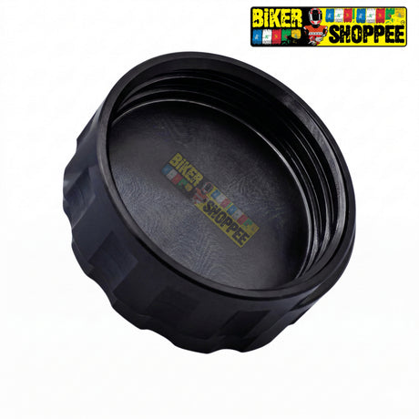 Black oil cap with 'Biker Shoppee' branding on a white background